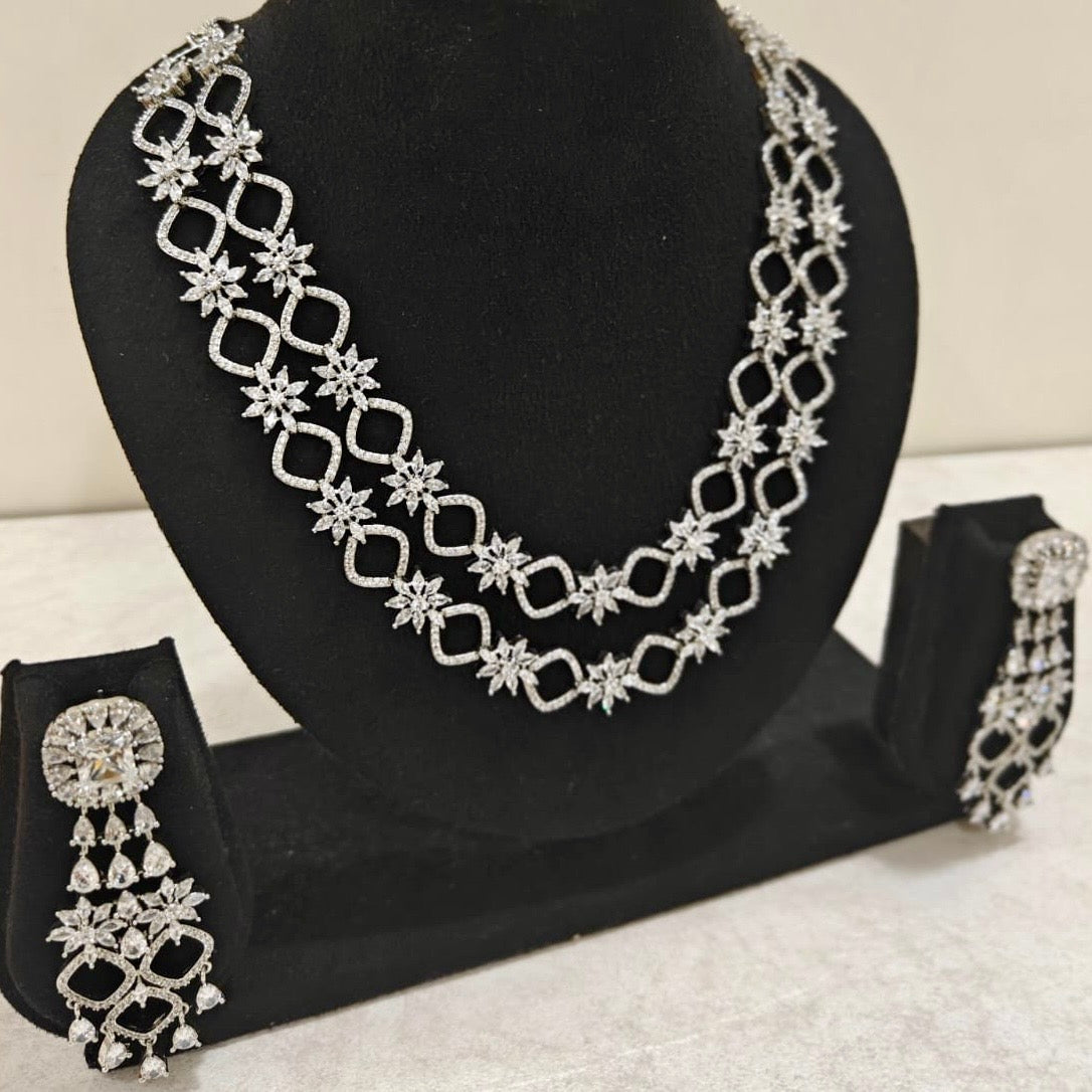 Elegant American Diamond double-layered necklace set with starburst design – perfect for weddings and parties