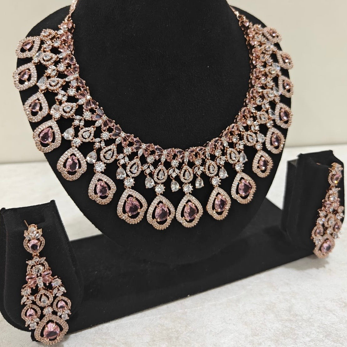 Elegant rose gold American Diamond necklace set with pink stones – bridal and party jewellery