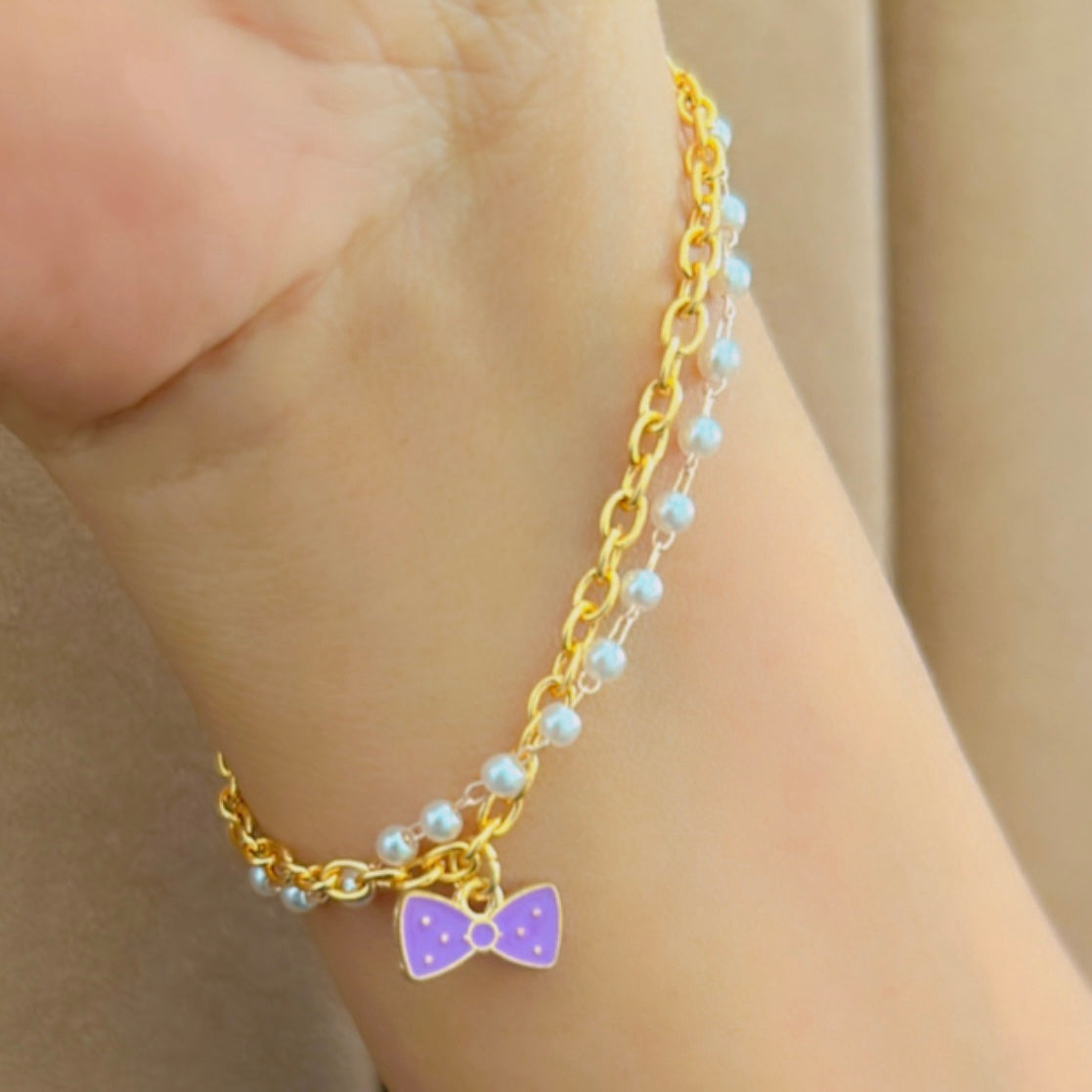 Elegant Golden Chain Bracelet with Purple Bow Charm