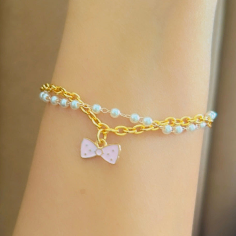 Elegant Golden Chain Bracelet with Light Pink Bow Charm