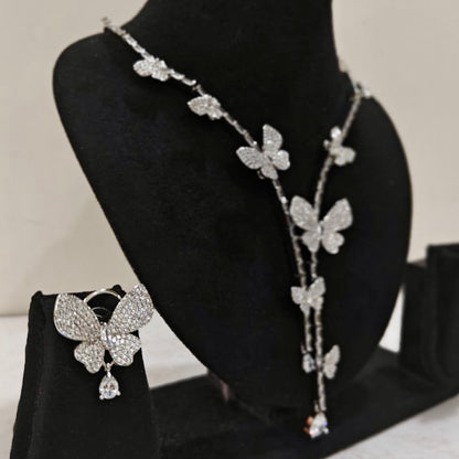 Side angle of butterfly necklace set with sparkling stones