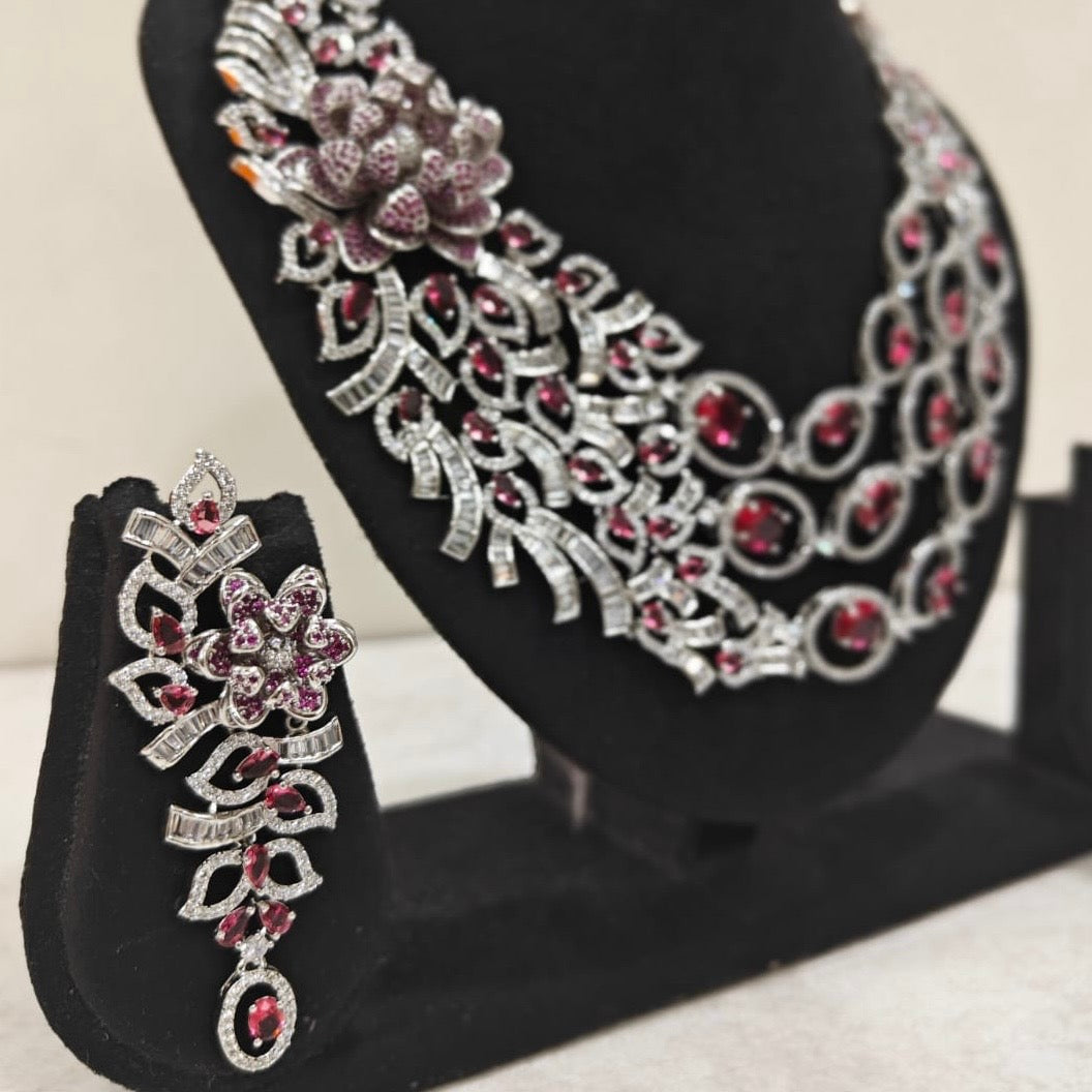 Side profile highlighting necklace and earring details