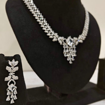 Side angle showcasing American Diamond drop earrings and matching bridal necklace