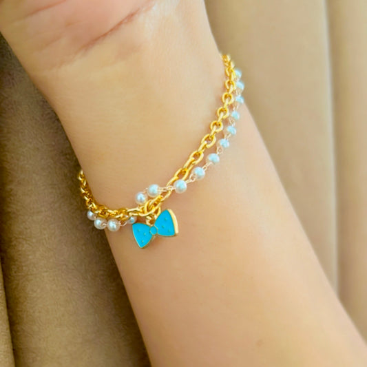Elegant Golden Chain Bracelet with Blue Bow Charm