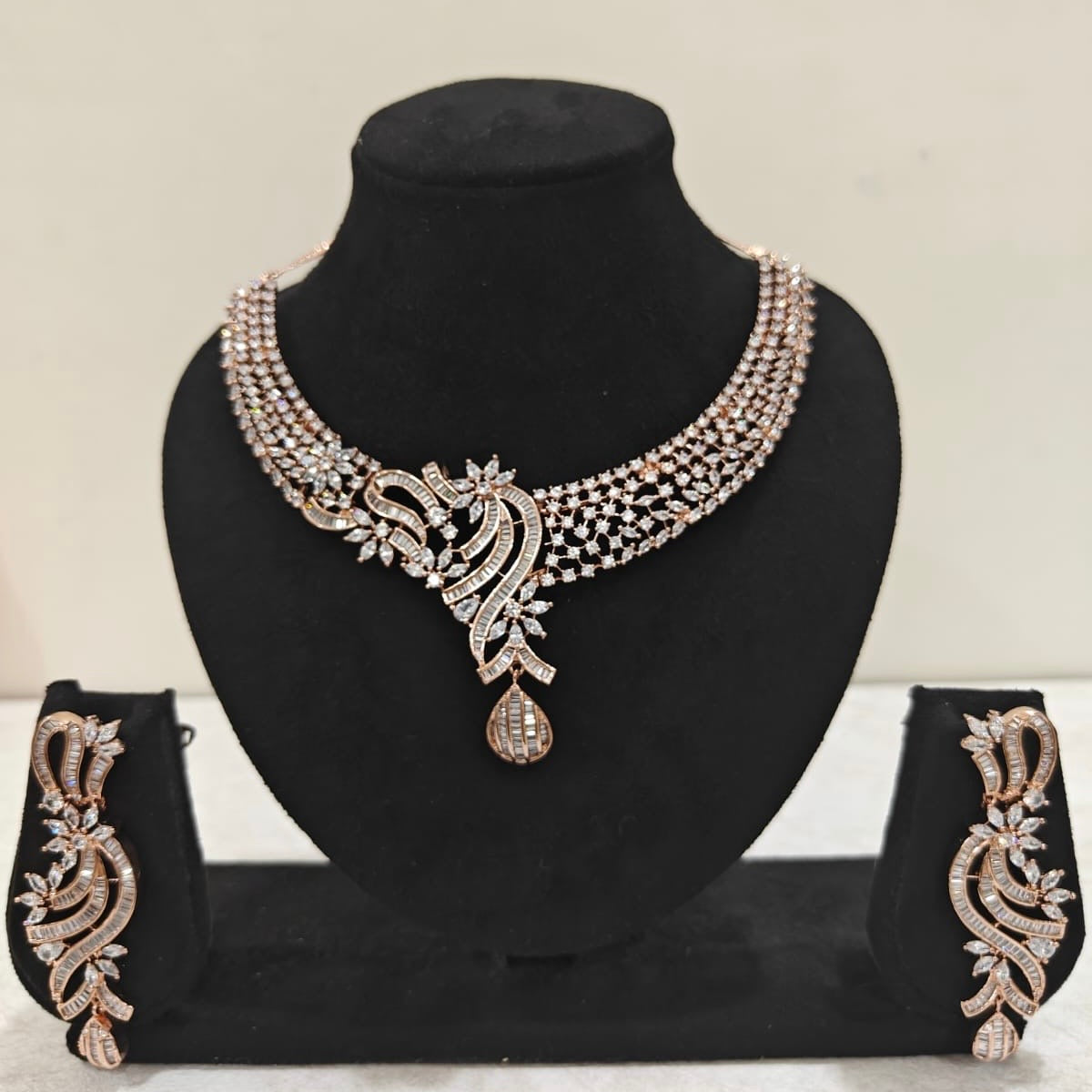 Rose gold American Diamond necklace set with floral swirl design and matching earrings – ThePandaStoree