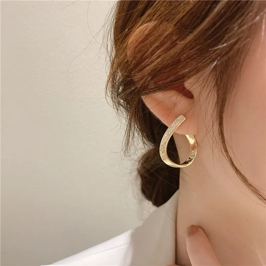 Elegant Gold Teardrop Earrings with Embedded Stones